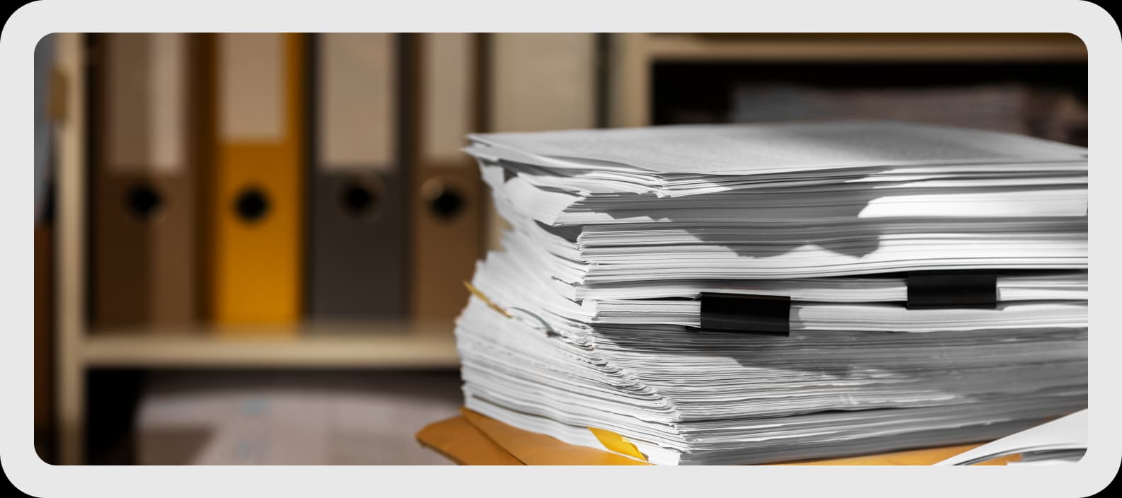 Compliance partner working at a desk in the 2000s