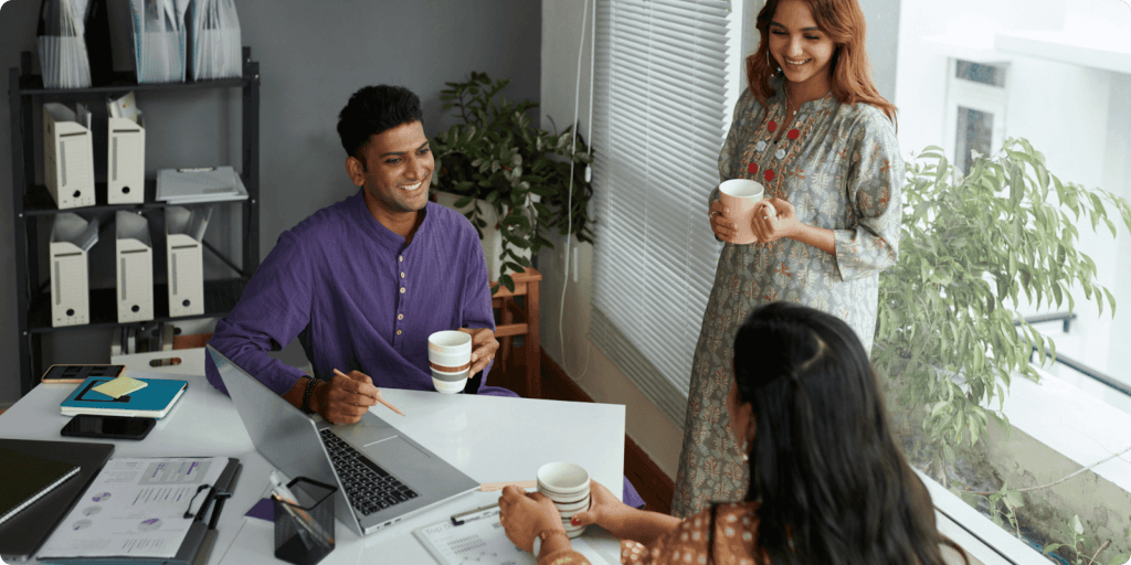 Small business team in meeting discussing business software investment strategies