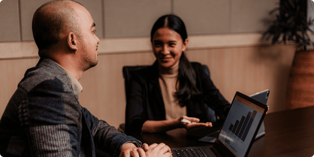 Tech advisor building software vendor partnerships in person.