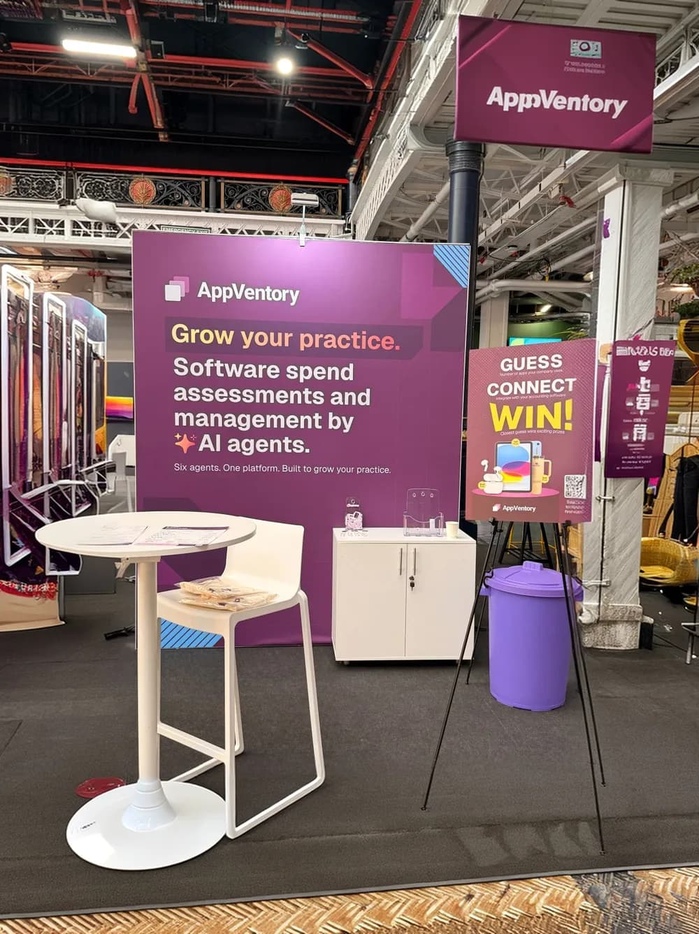 The AppVentory stand at the show, with signage for software spend assessments